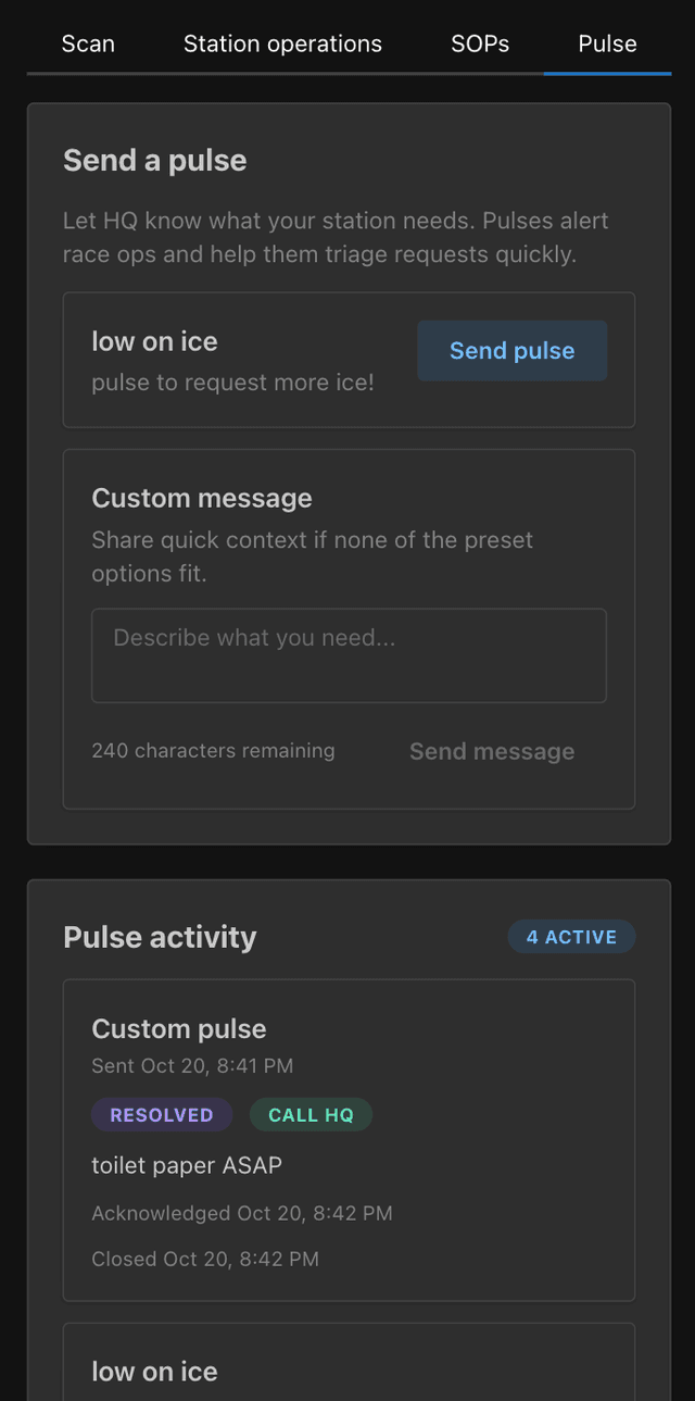 Volunteer scanning drop bags at an aid station